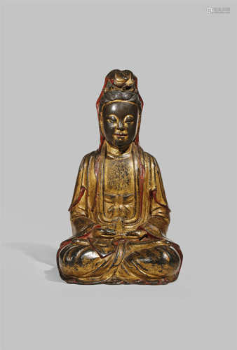 A CHINESE GILT AND LACQUERED BRONZE FIGURE OF GUANYIN