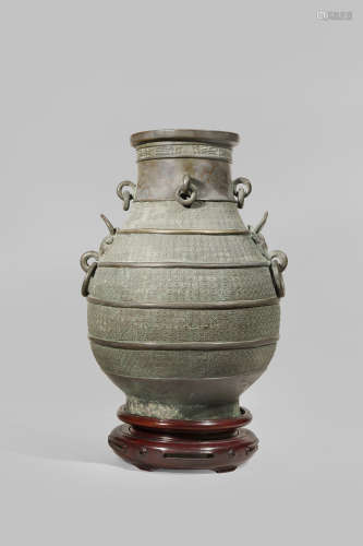 A CHINESE BRONZE ARCHAISTIC HU-SHAPED VASE