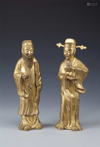 A PAIR OF CHINESE GILT-BRONZE FIGURES OF IMMORTALS