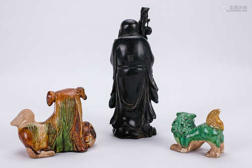 Three pieces of Chinese pottery figures.