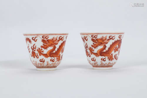 Pair of Chinese iron red porcelain cups, Tongzhi mark.