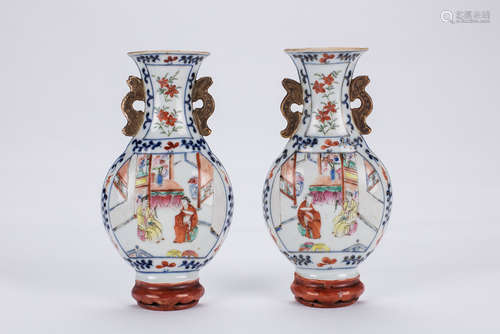 Pair of Chinese famille rose porcelain wall vases.