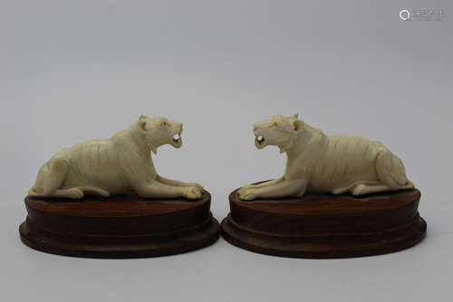 Pair of Indian carved bone lions.