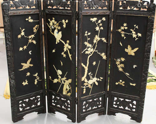 Chinese four-panel screen with carved bone decorations.