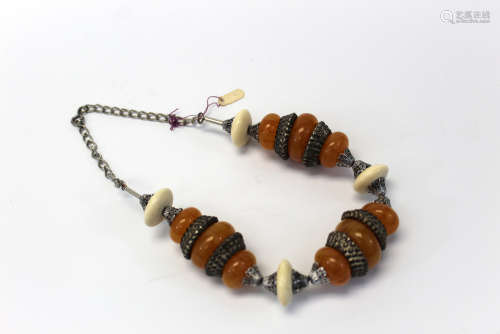An amber-like beaded necklace