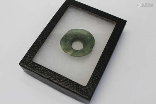 Pre-Columbian Mayan jade ear spool.