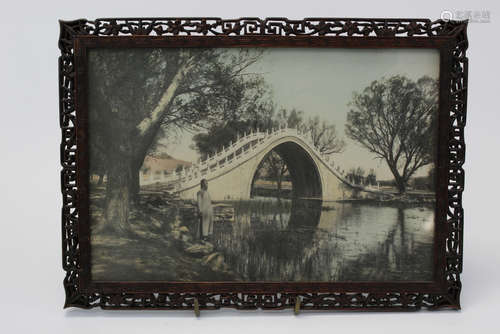 Old photo in carved hard wood frame.