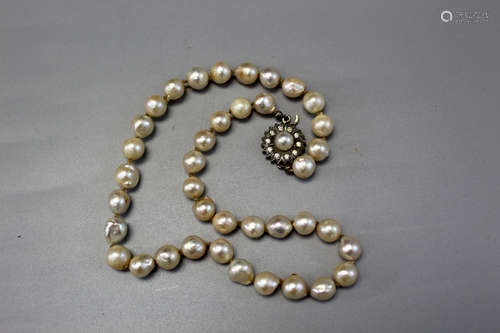 Pearl necklace.