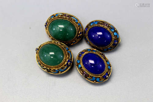 Two pairs of Chinese enameled silver earrings. One is