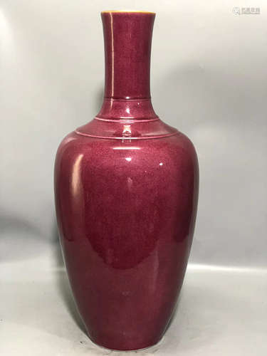 A RED GLAZED GUANYIN VASE