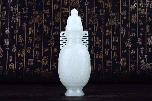 1949-1966,  A FLORAL DESIGN HETIAN JADE BAS-RELIEF VASE