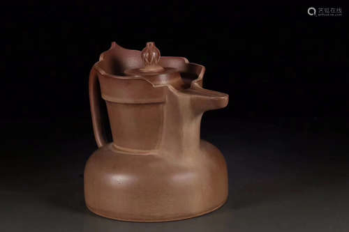 A CAP SHAPE PURPLE CLAY TEAPOT