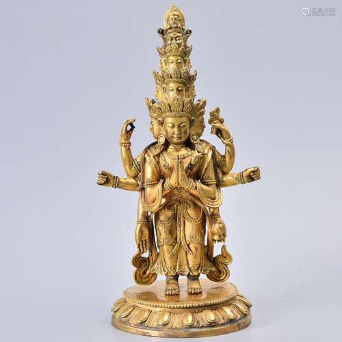 A GILT-BRONZE FIGURE OF EKADASHAMUKHA-LOKESHVARA