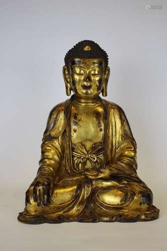 A GILT-BRONZE FIGURE OF GUANYIN