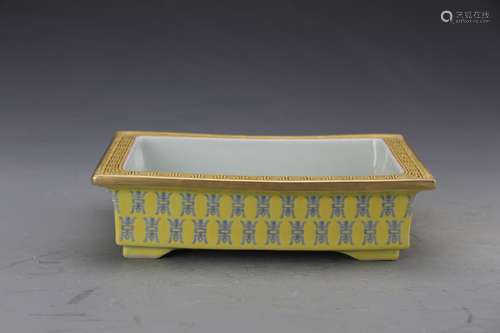 A YELLOW GLAZED RETANGULAR FLOWER POT