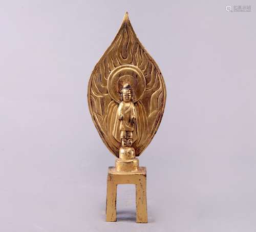 A GILT-BRONZE FIGURE OF BUDDHA