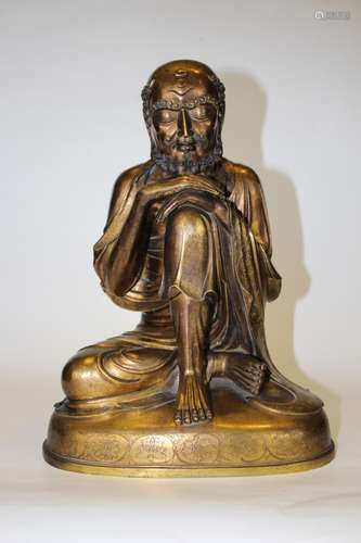 A BRONZE FIGURE OF BUDDHA