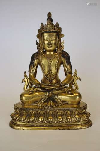 A GILT-BRONZE FIGURE OF MAITREYA