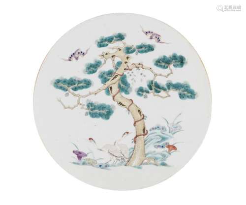 A Chinese porcelain circular plaque