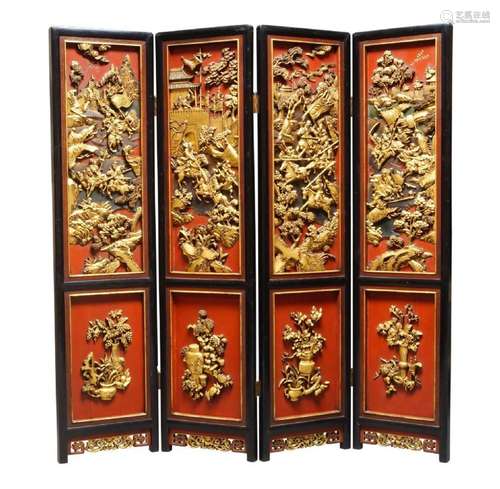 A Chinese lacquer and carved wood four section three fold screen