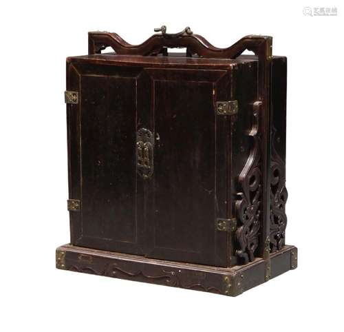 A Chinese softwood travelling cabinet