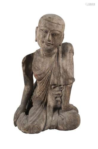 A Thai carved wood kneeling buddha