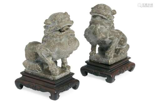 A pair of Chinese carved stone Buddhist lions
