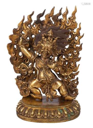 A Sino-Tibetan gilt bronze figure of Mahakala