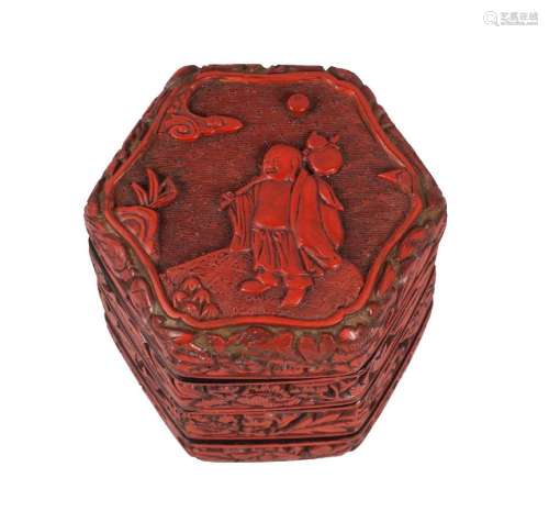 A Chinese cinnabar lacquer four-section stacking box