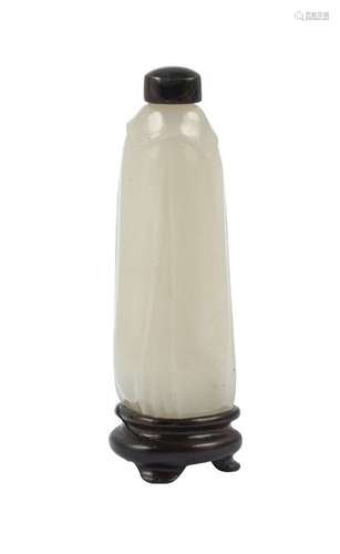 A Chinese pale green jade snuff bottle