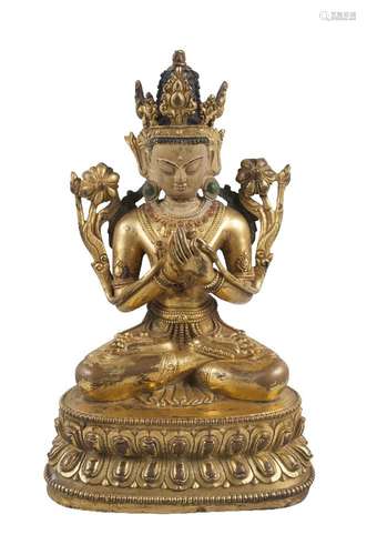 A Sino-Tibetan gilt bronze jewelled figure of Maitreya