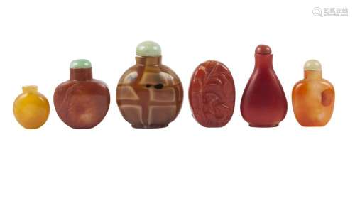 Six Chinese glass and hardstone snuff bottles