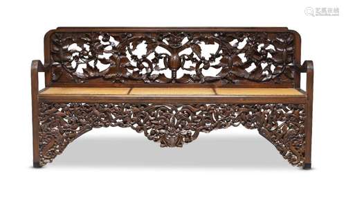 A Thai hardwood cane seated bench