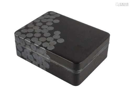 A Japanese black lacquer box and cover