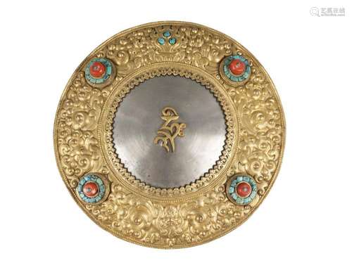 A large Tibetan gilt copper and zinc oracle mirror