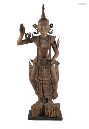 A large Thai carved wood dancing deity