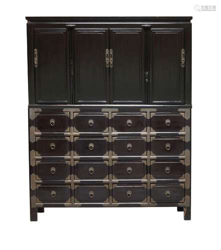 A large Chinese black lacquered wood cabinet