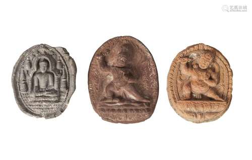 Three Tibetan terracotta votive plaques