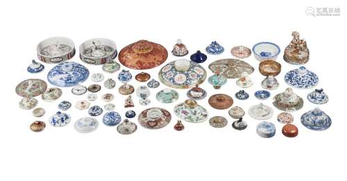 A large collection of Chinese and Japanese porcelain lids