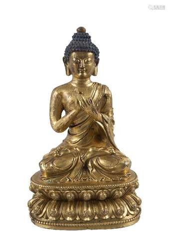 A Sino-Tibetan gilt bronze Shakyamuni Buddha