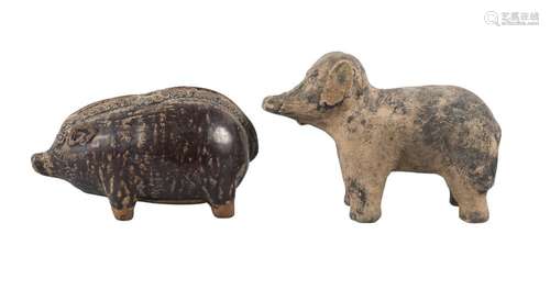 A Chinese treacle glazed pottery pig and a stoneware elephant