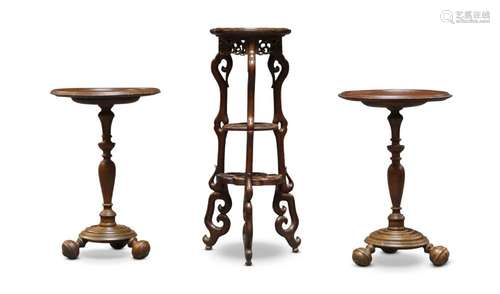 A Chinese hardwood three tier jardiniere stand and a pair of tripod wine tables