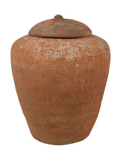 A Chinese terracotta lidded jar with Sanskrit inscriptions