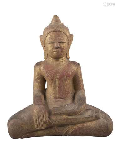 A large Burmese carved gilt stone buddha