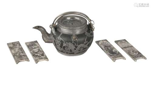 A Chinese pewter mounted black Yixing tea pot and four landscape decorated scroll weights