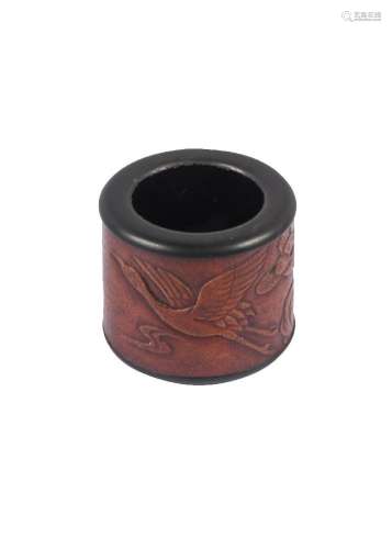 A Chinese carved gourd and black lacquer archer's ring