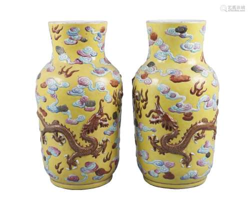 A pair of Chinese porcelain molded baluster vases