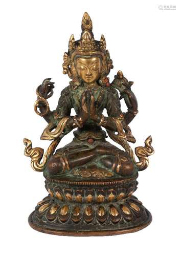 A Sino-Tibetan parcel gilt bronze figure of Tara