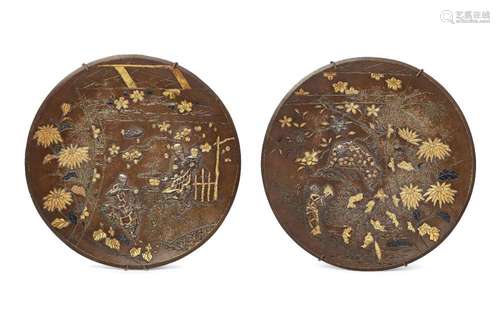 A pair of Japanese bronze circular plaques