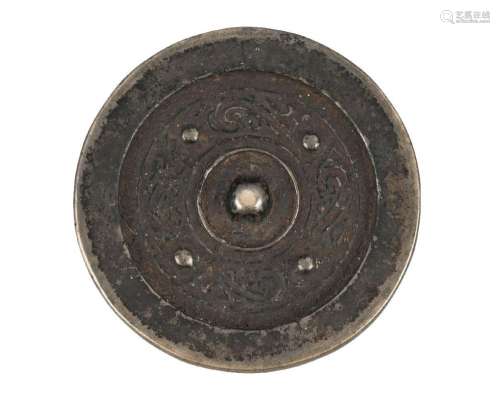 A Chinese bronze circular mirror